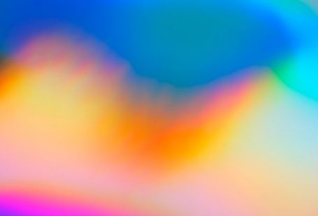Color Psychology - a blurry image of a rainbow colored background
