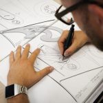 Product Design - person writing on white paper