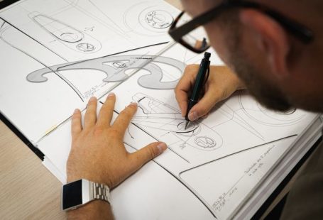 Product Design - person writing on white paper