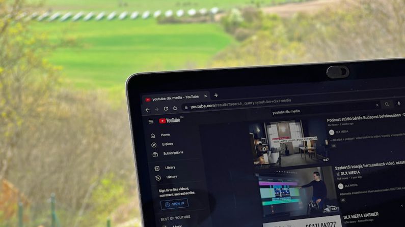 Video SEO - a laptop computer sitting on top of a table