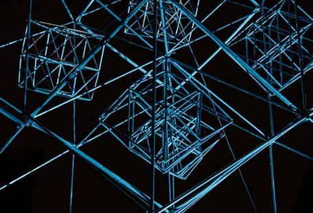 SWOT Infographic - a close up of a metal structure in the dark