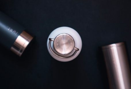 Content Recycling - silver and black round device