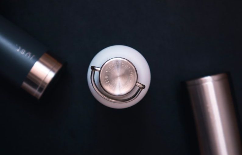 Content Recycling - silver and black round device