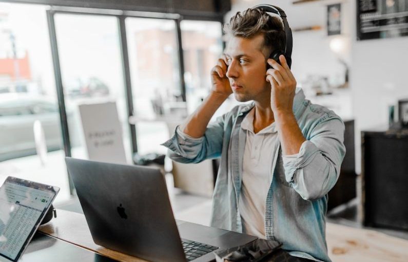 Conversion Funnel - men's blue collared top near silver MacBook