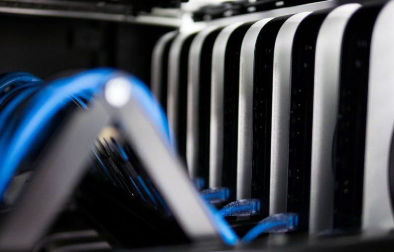 Structured Data - a close up of a bunch of wires in a rack