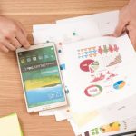 Pie Chart - person holding white Samsung Galaxy Tab