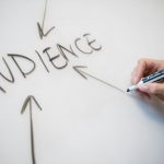 Omnichannel Marketing - person writing on white paper