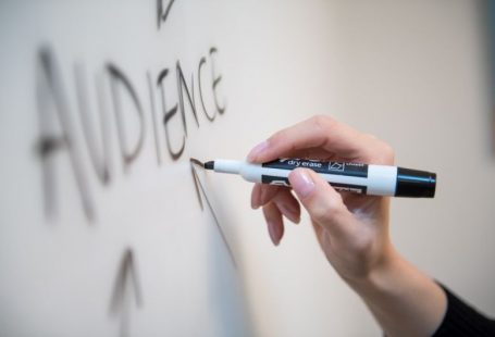 Followers Growth - person holding white and blue click pen