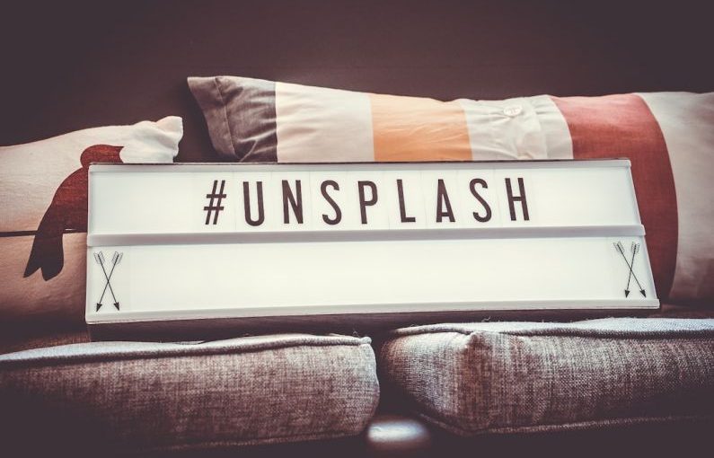 Hashtags Sign - white and black unsplash signage