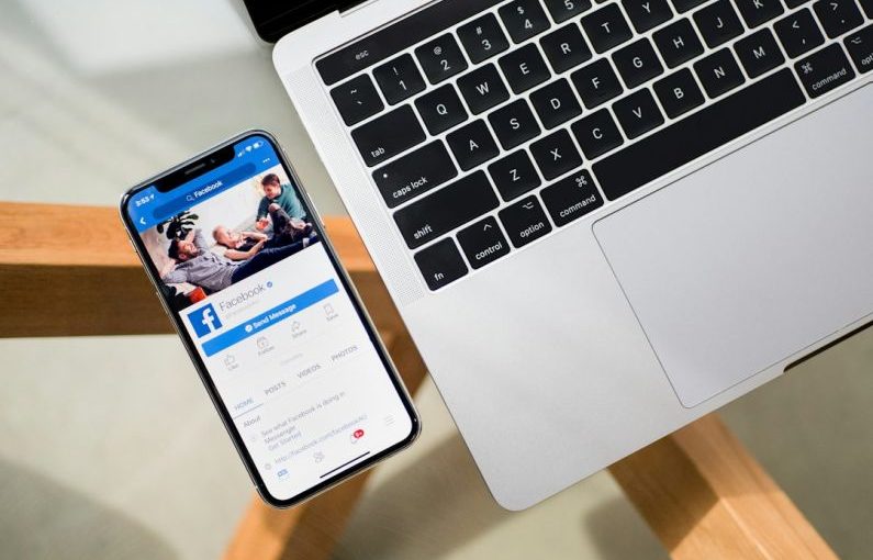Social Media Ads - iPhone X beside MacBook
