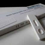 Negative Feedback - white pregnancy test kit showing negative result
