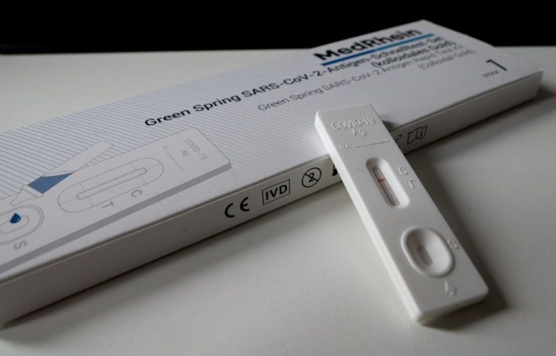 Negative Feedback - white pregnancy test kit showing negative result