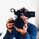 Video Marketing - person holding DSLR camera