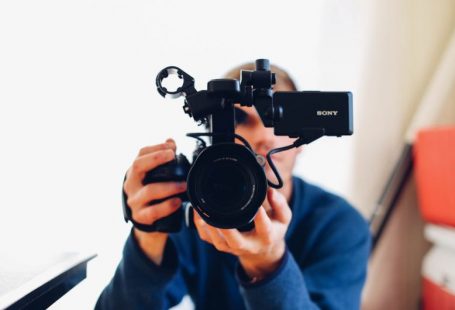 Video Marketing - person holding DSLR camera