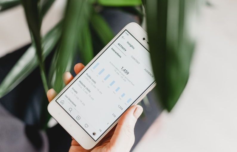 Stories Engagement - person using Android smartphone