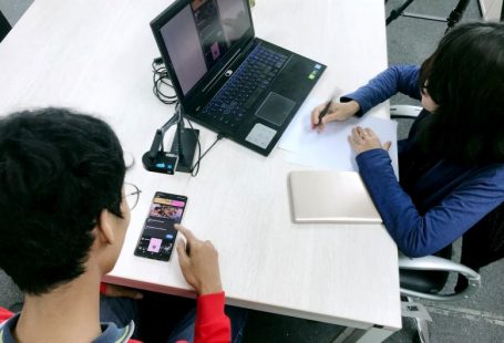 A/B Testing - person in blue long sleeve shirt using black laptop computer