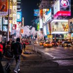 Retargeting Ads - people walking beside buildings