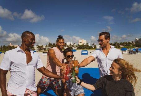 Brand Activation - group of people standing on beach during daytime